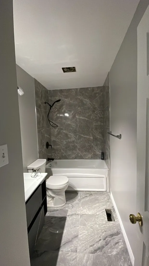 Bathroom with grey marble-look tile
